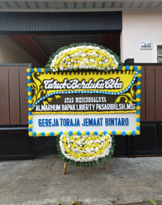 Papan Bunga Duka di Ilu
